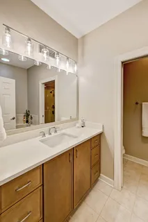a bathroom with a bathtub and a sink