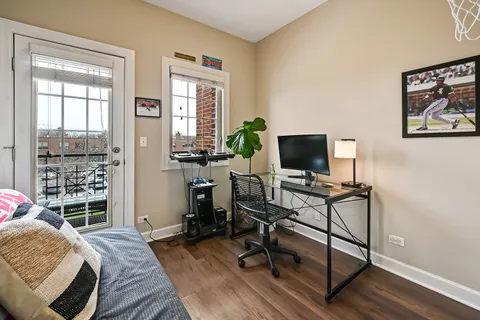 a balcony view with a potted plant