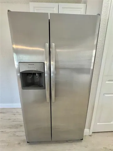 a close view of a refrigerator in kitchen