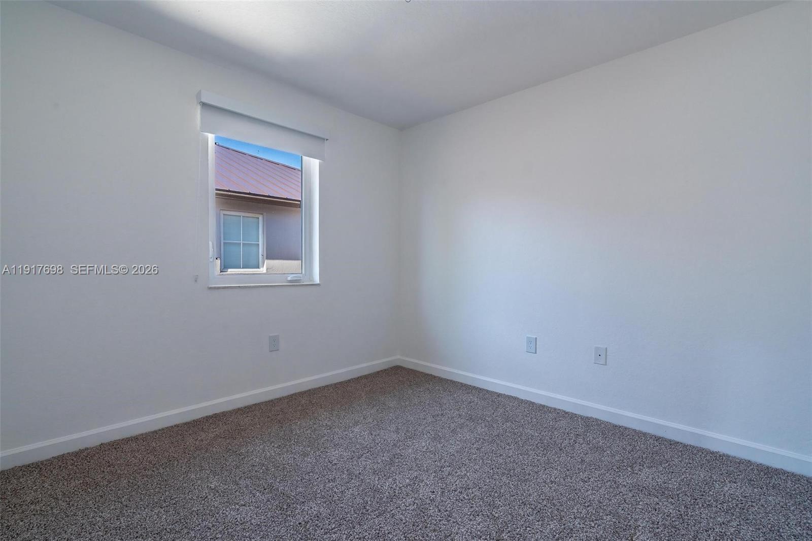 4371 Southwest 160th Avenue, Unit 211 Miramar, FL 33027 - Photo 15 of 31 an empty room with a window
