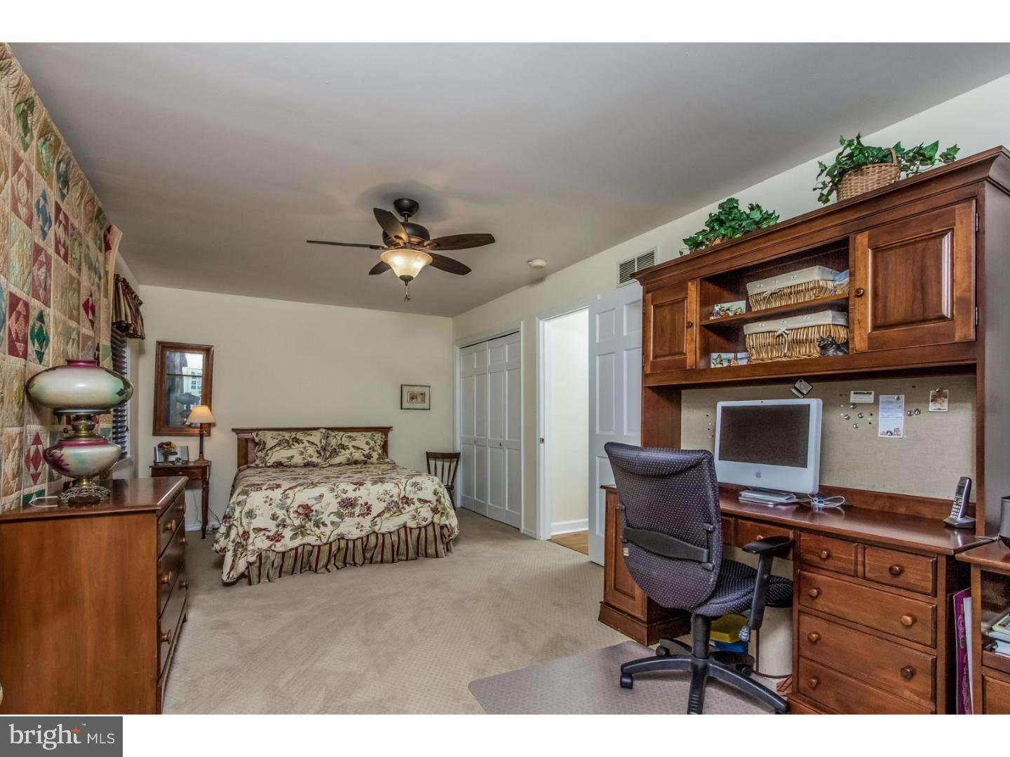 82 Arneytown-Hornerstown Road Cream Ridge, NJ 08514 - Photo 22 of 25 a bedroom with furniture and a chair