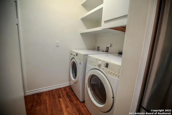 a view of washer and dryer in a utility room