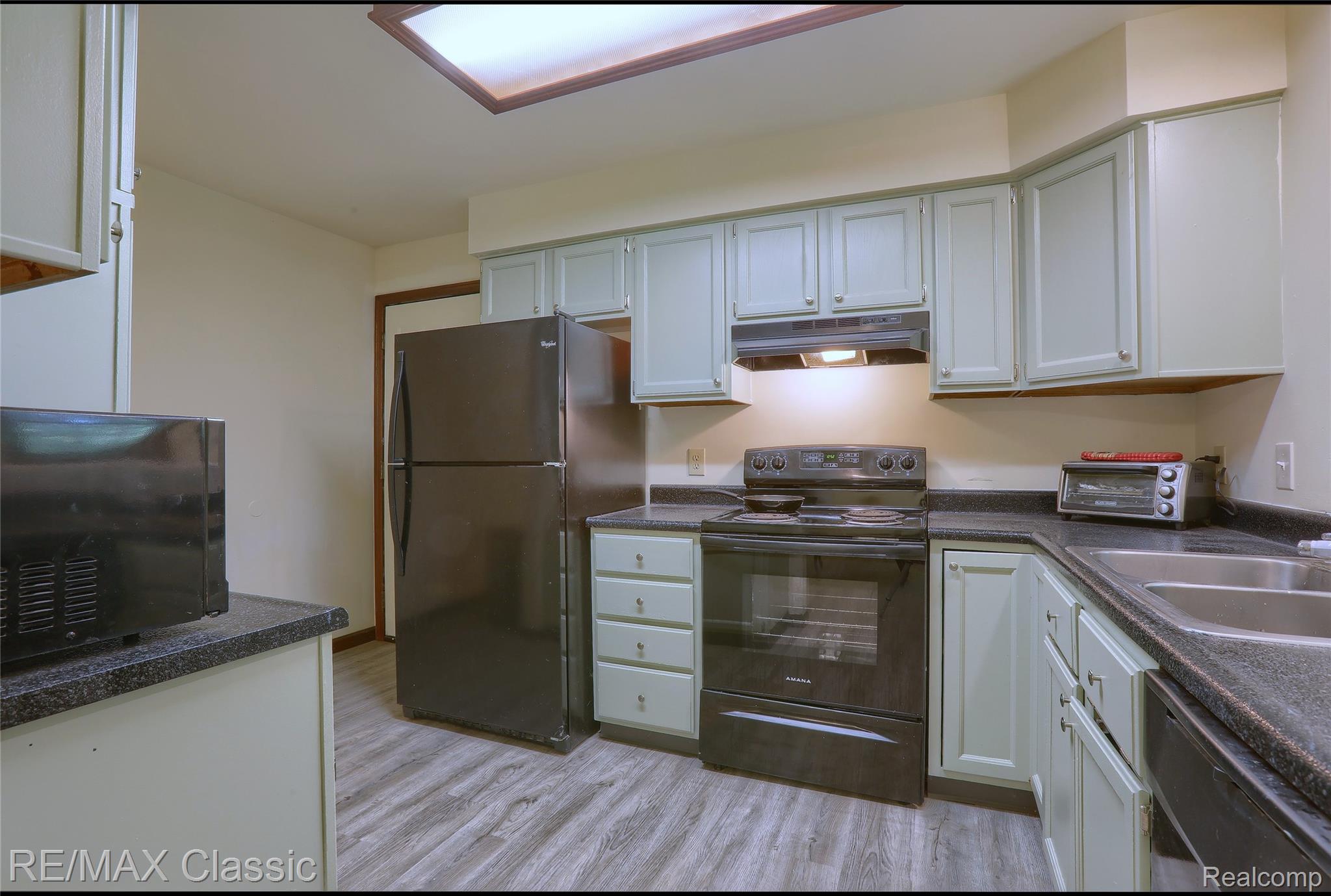 16645 Bordman Road Allenton, MI 48002 - Photo 13 of 48 Kitchen view with double sink