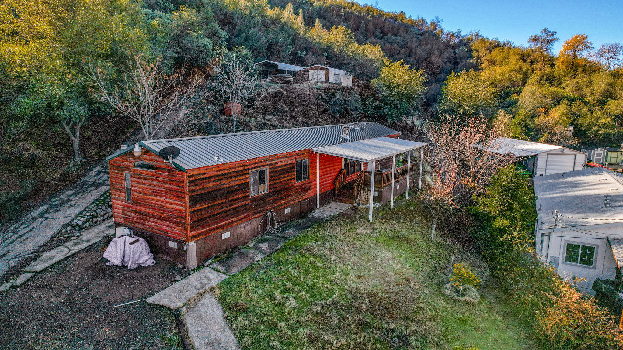 22155 Ravine Court Redding, CA 96003 - Photo 1 of 57 Nestled in the hillside