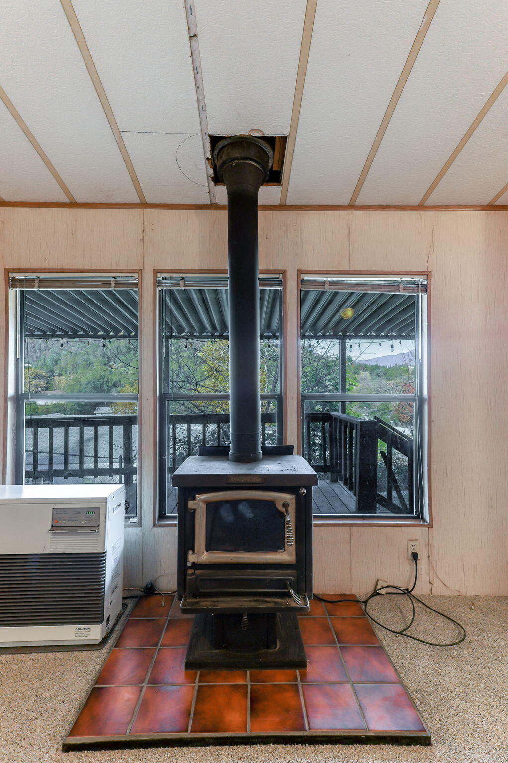 22155 Ravine Court Redding, CA 96003 - Photo 40 of 57 Monitor Heater & Wood Stove