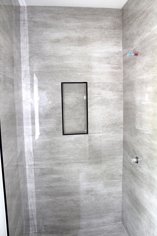 30 Mendon Street Upton, MA 01568 - Photo 14 of 26 a view of a bathroom shower