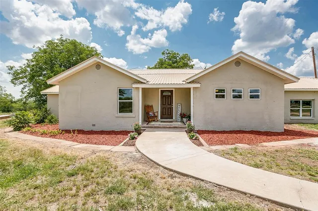 a view of outdoor space yard and garage