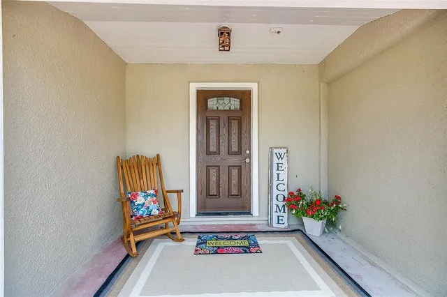 a front door with a couch