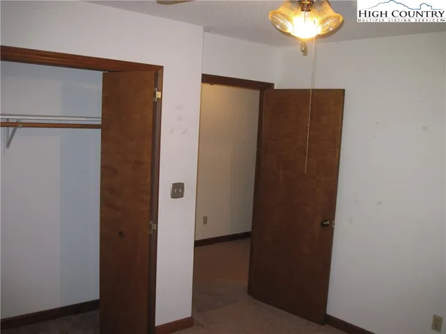 a bathroom with a light fixture and a sink