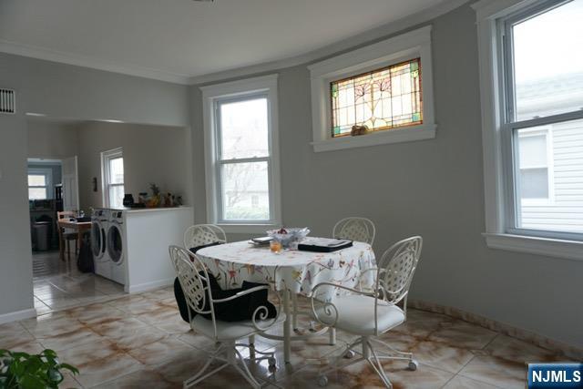 88 Shaler Avenue Fairview, NJ 07022 - Photo 12 of 22 a dining room with furniture and window