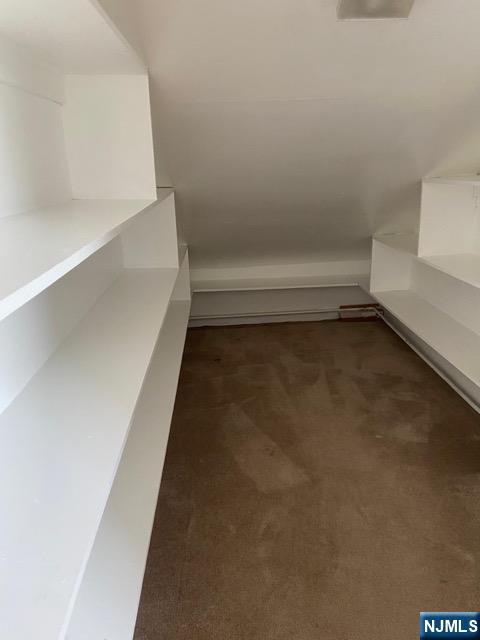 88 Shaler Avenue Fairview, NJ 07022 - Photo 20 of 22 a view of an empty walk in closet