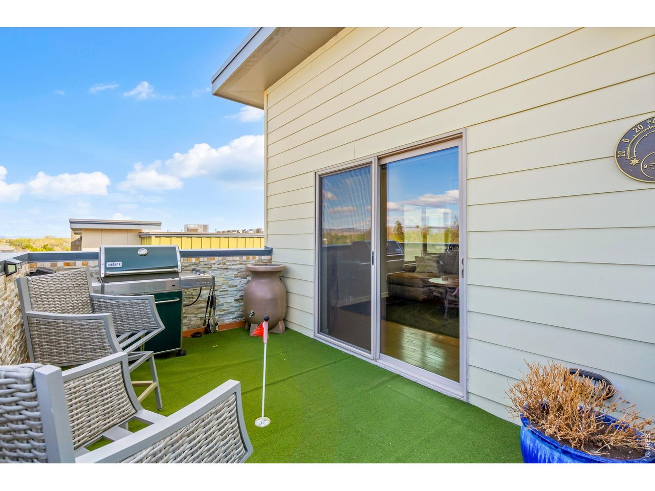 204 Maple Street, Unit 401 Fort Collins, CO 80521 - Photo 12 of 47 a view of a terrace with chairs