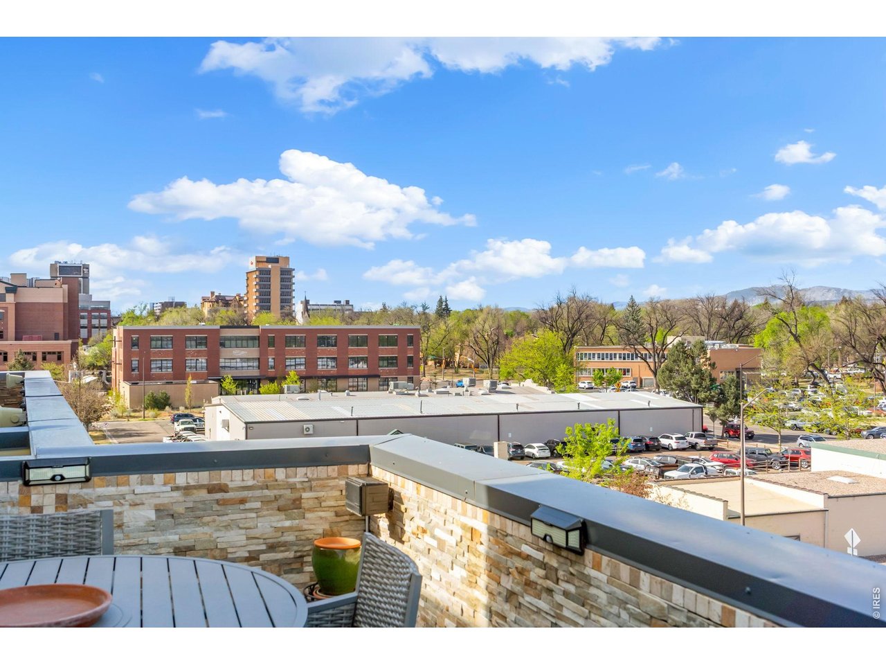 204 Maple Street, Unit 401 Fort Collins, CO 80521 - Photo 15 of 47 a view of city from a balcony