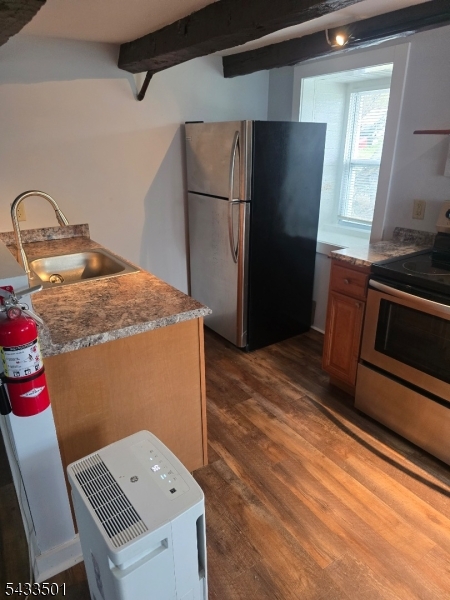 16 Musconetcong River Road, Unit 2 Hampton, NJ 08827 - Photo 12 of 12 a kitchen with a refrigerator and a stove
