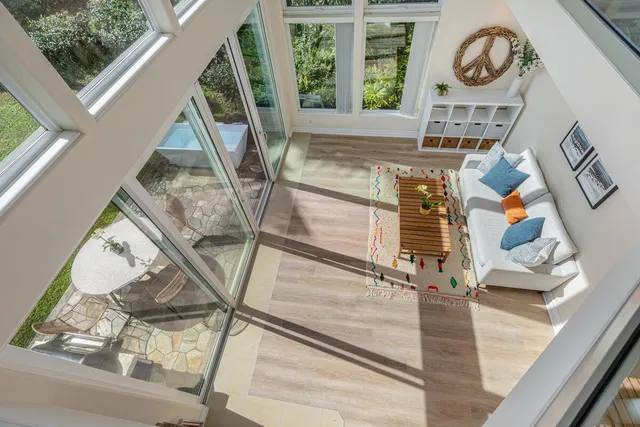 a view of living room with furniture and floor