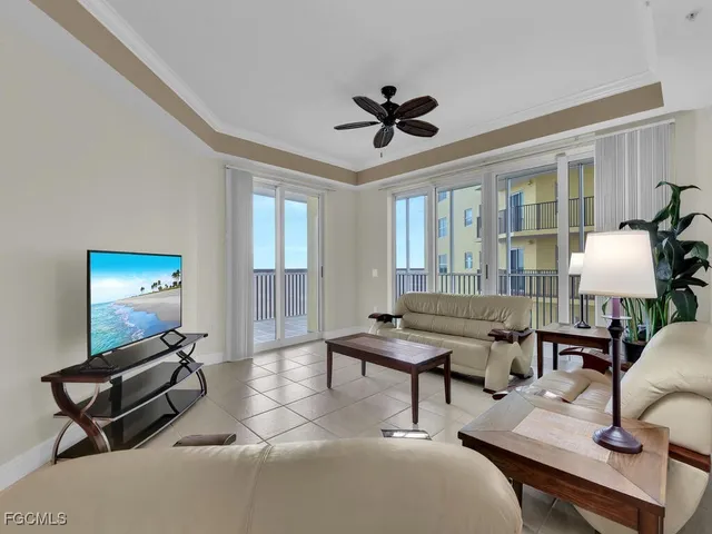 a view of kitchen with microwave and cabinets