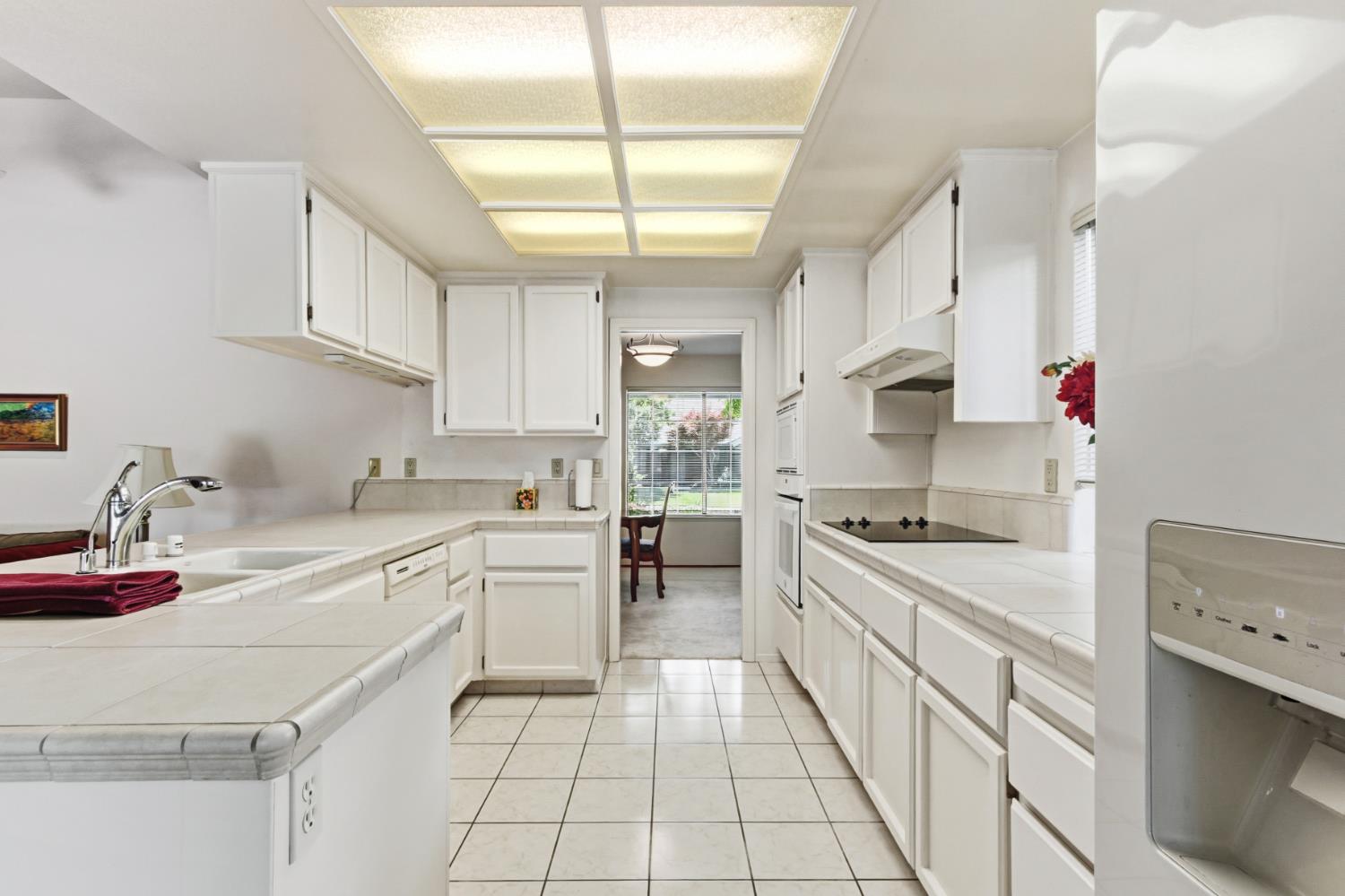 11609 Boom Pointer Way Rancho Cordova, CA 95670 - Photo 21 of 60 Looking through kitchen into formal dining room