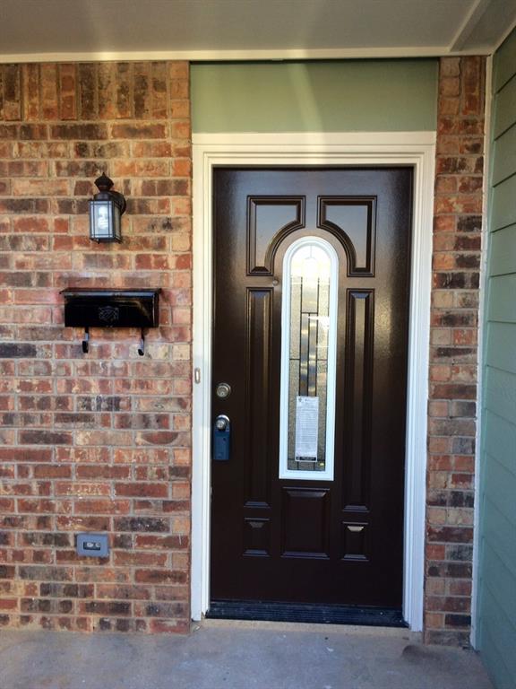 1416 Elms Road Irving, TX 75060 - Photo 1 of 7 a front view of a house with entryway