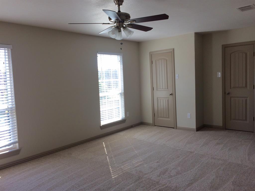 1416 Elms Road Irving, TX 75060 - Photo 6 of 7 a view of an empty room with a window