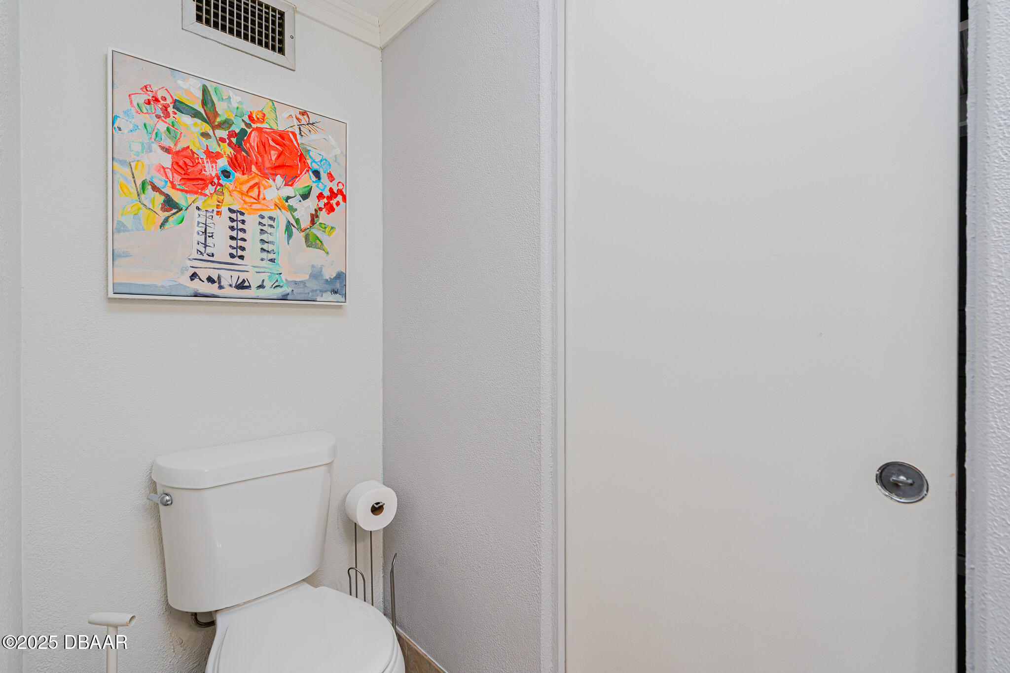 46 Oceanview Avenue Ponce Inlet, FL 32127 - Photo 23 of 79 a white toilet sitting next to a small bathroom