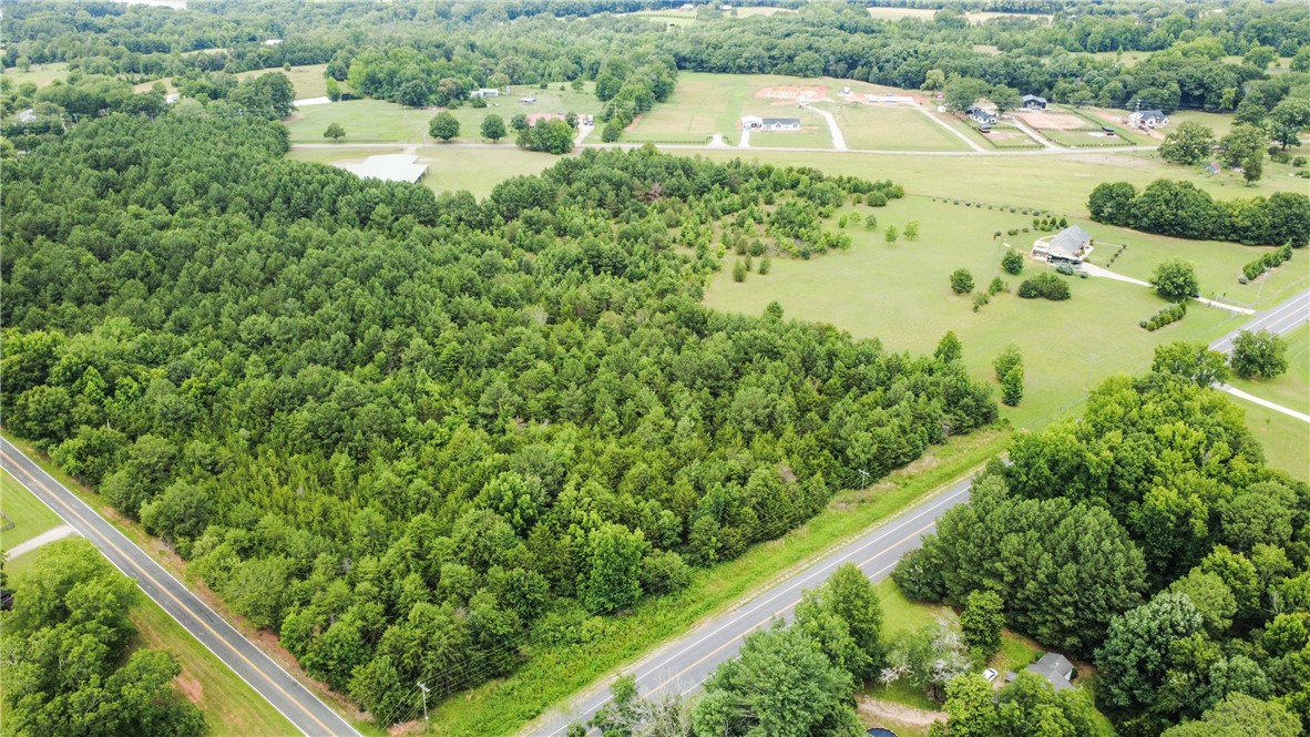 2900 Highway 187 Anderson, SC 29626 - Photo 32 of 41 An aerial perspective reveals a vast expanse of verdant land, promising serene rural living.