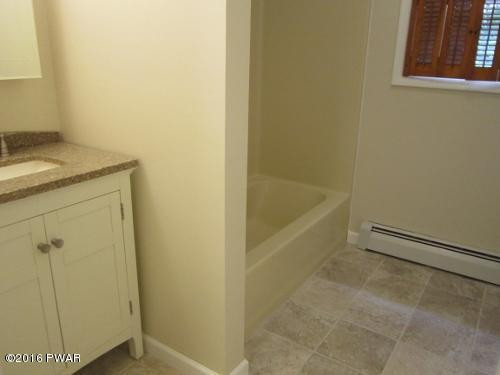 199 Garrity Road Hawley, PA 18428 - Photo 13 of 18 15 BATHROOM WITH NEW VANITY, CERAMIC FLO