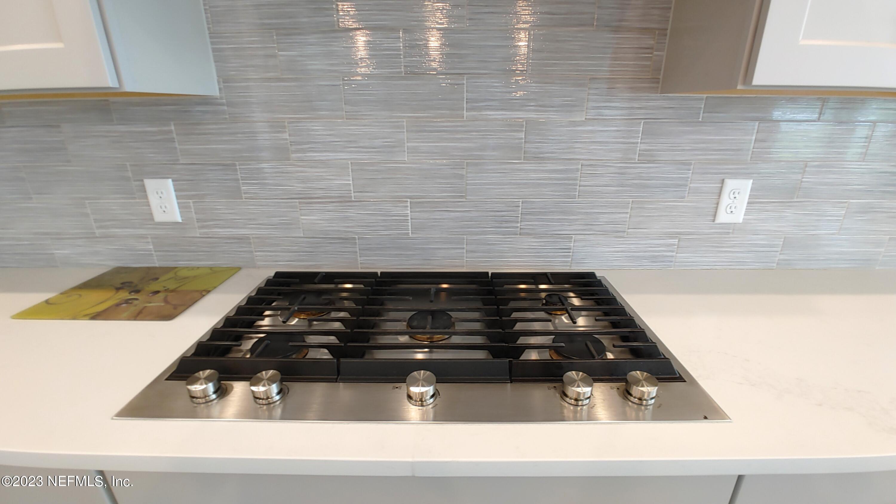 133 Pavati Point St. Johns, FL 32259 - Photo 14 of 46 a close up of a stove top oven sitting on a counter