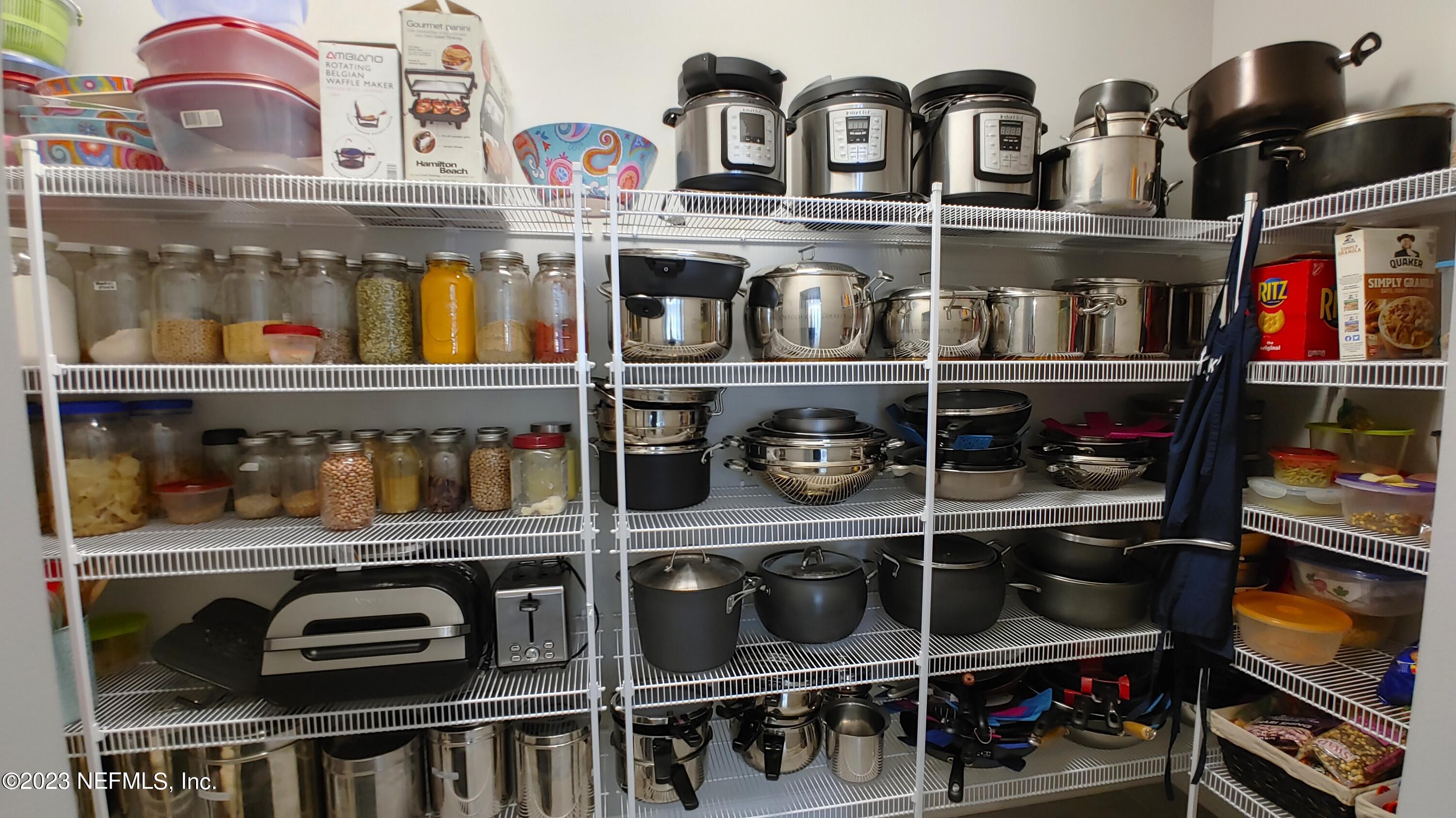 133 Pavati Point St. Johns, FL 32259 - Photo 17 of 46 a store room with lots of different colored cloths