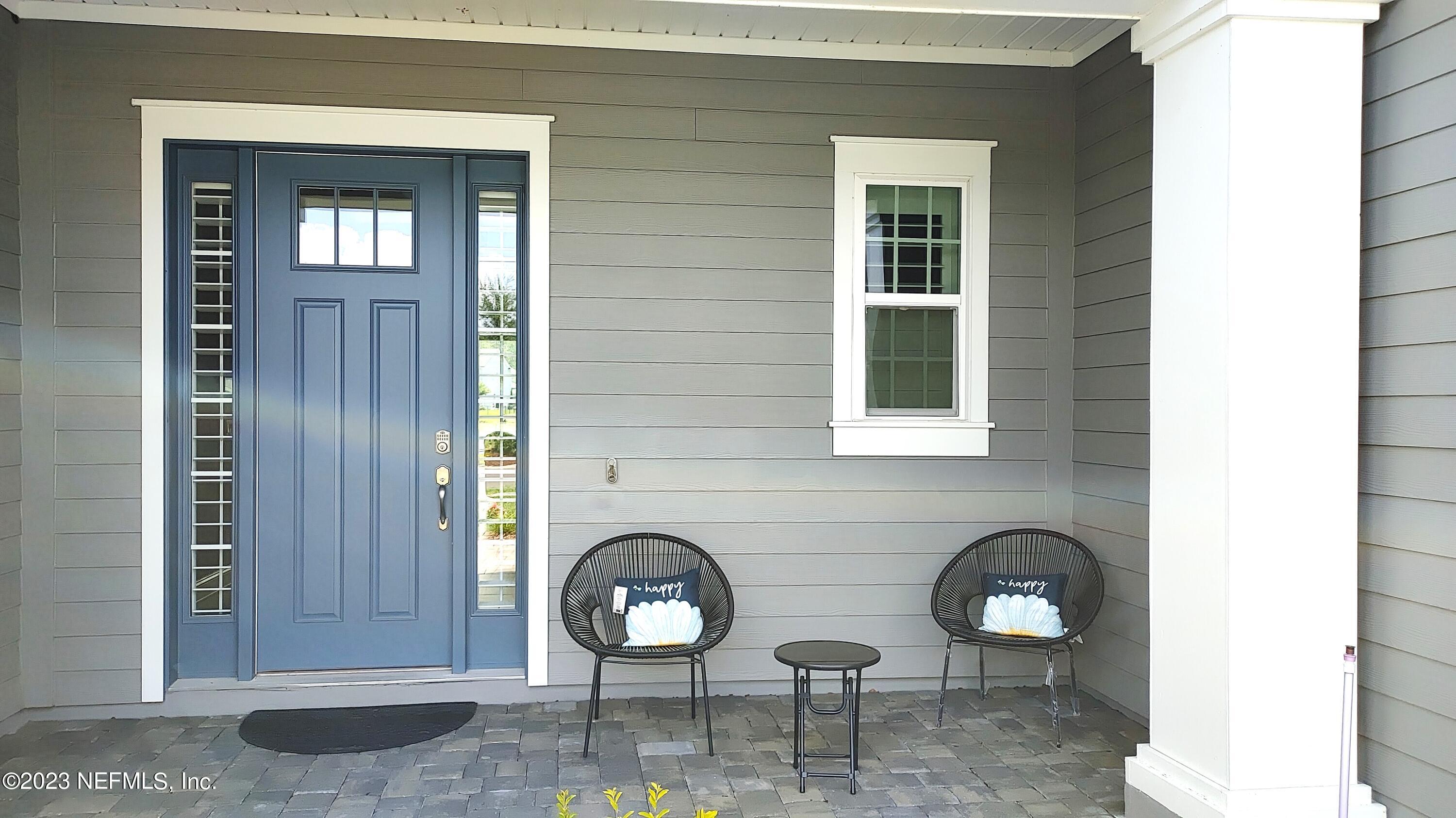 133 Pavati Point St. Johns, FL 32259 - Photo 2 of 46 a front view of a house with entryway