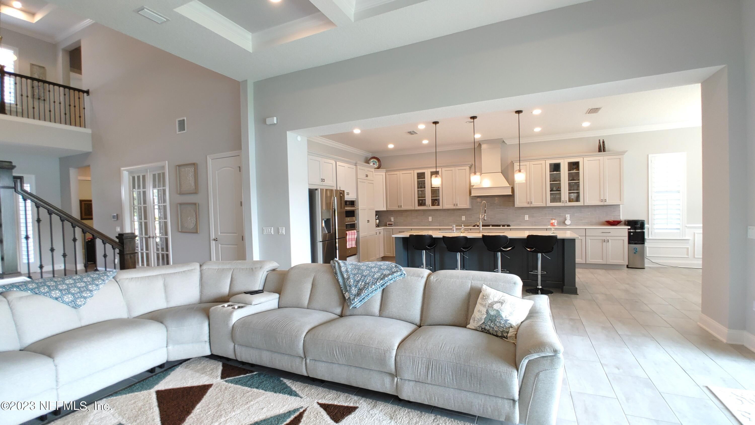 133 Pavati Point St. Johns, FL 32259 - Photo 30 of 46 a living room with furniture and a large window