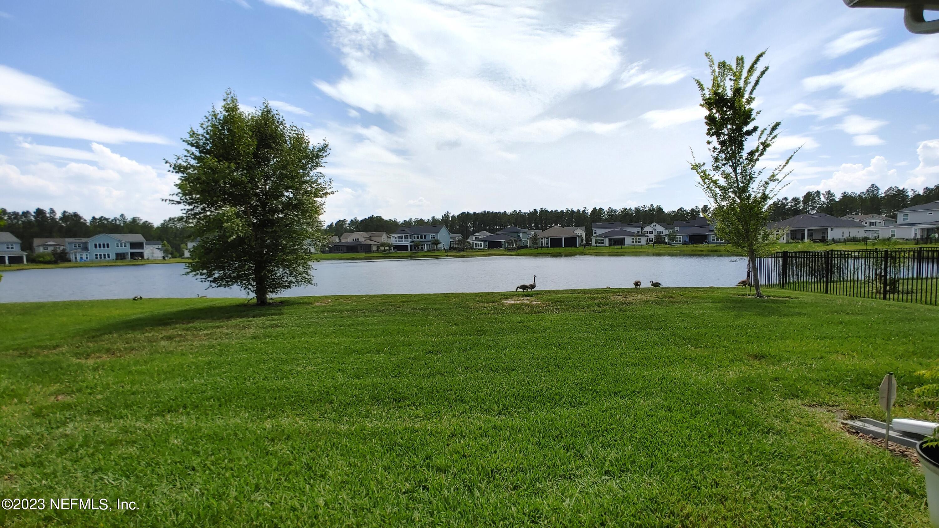 133 Pavati Point St. Johns, FL 32259 - Photo 46 of 46 a view of lake with houses in the background