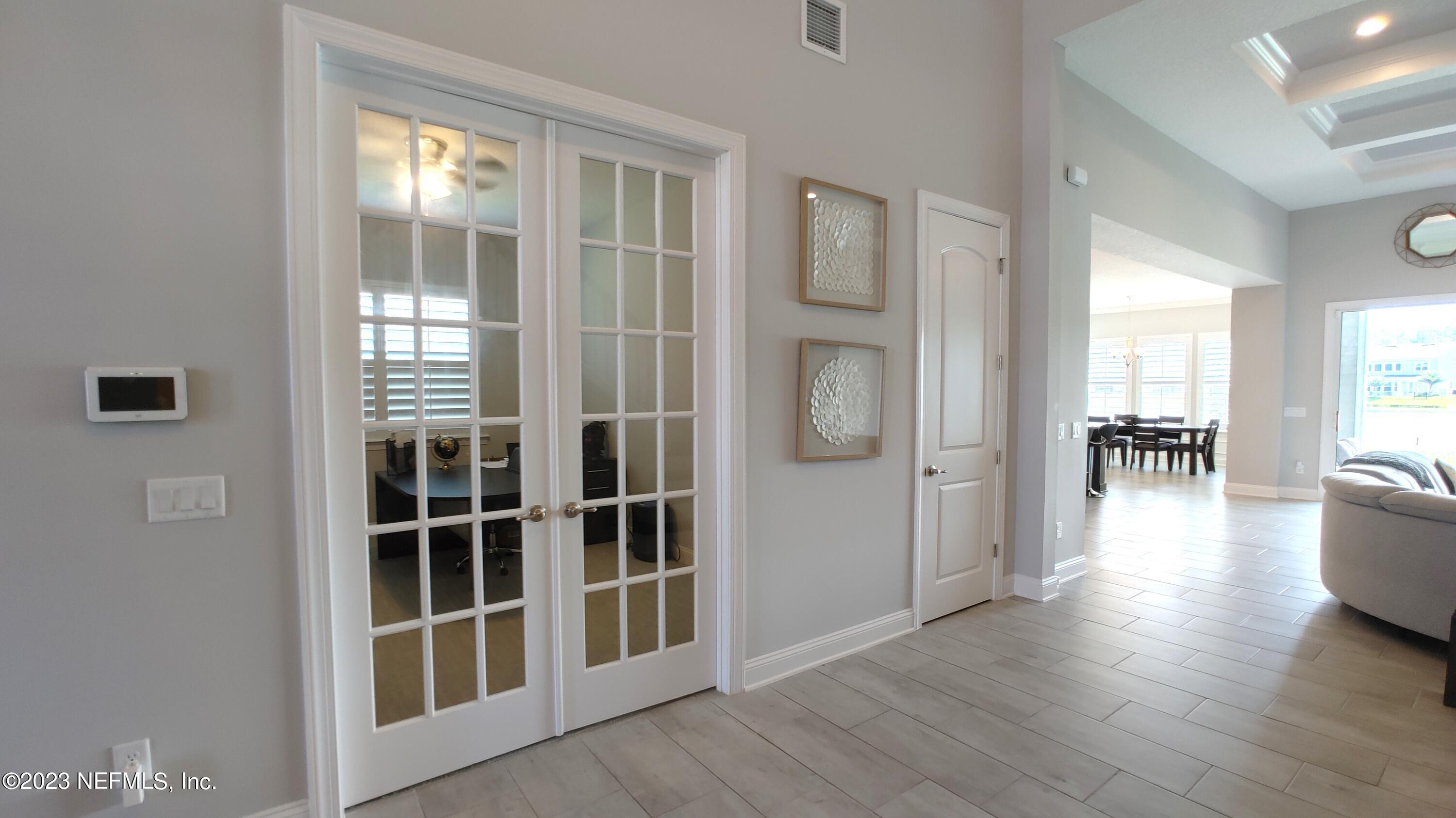 133 Pavati Point St. Johns, FL 32259 - Photo 6 of 46 an empty room wooden floor and windows