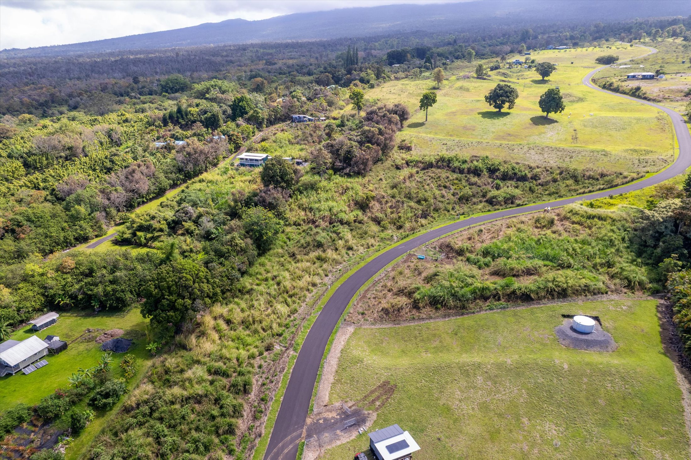 75-7140 Lot 1-a-5 Kuahewa Road Holualoa, HI 96725 - Photo 1 of 9 a view of a swimming pool with a yard