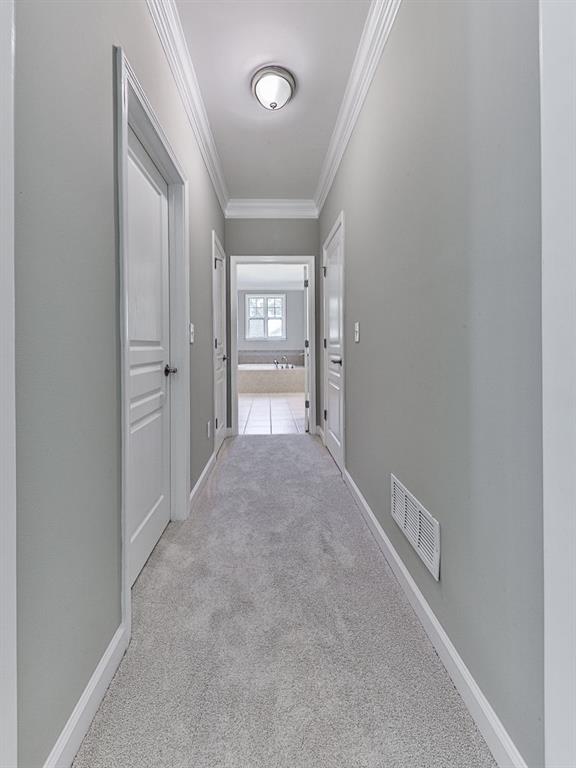 626 Laurel Crossing Canton, GA 30114 - Photo 31 of 77 a view of a hallway to a bedroom