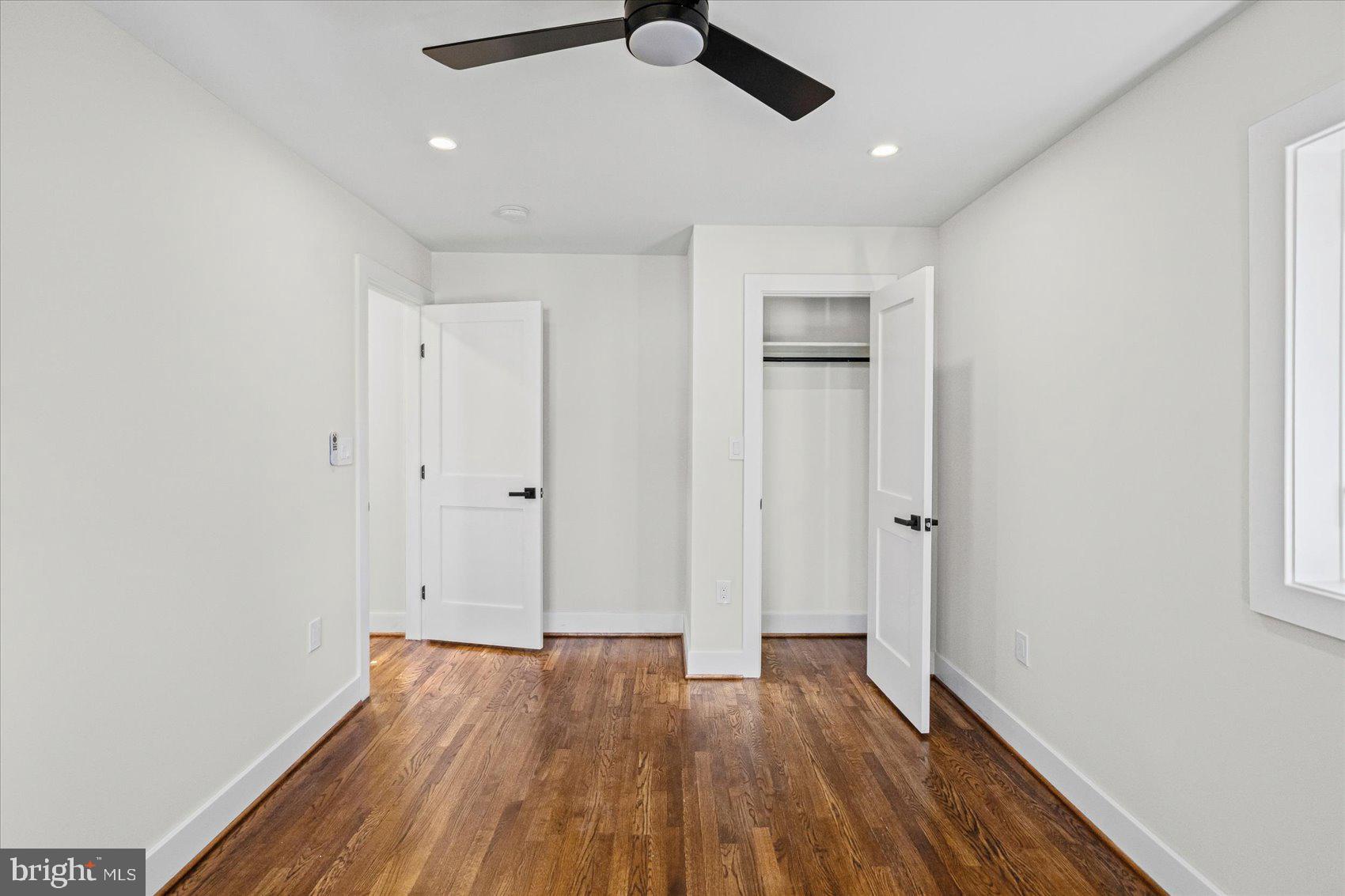 605 Elfin Avenue Capitol Heights, MD 20743 - Photo 23 of 42 wooden floor in an empty room with a window