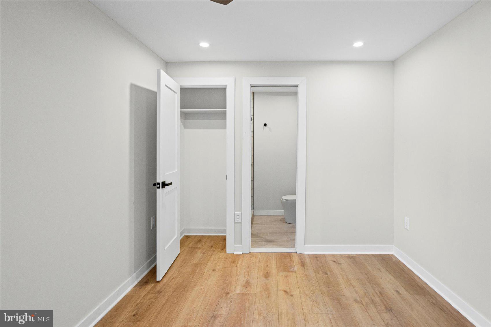 605 Elfin Avenue Capitol Heights, MD 20743 - Photo 30 of 42 wooden floor in an empty room