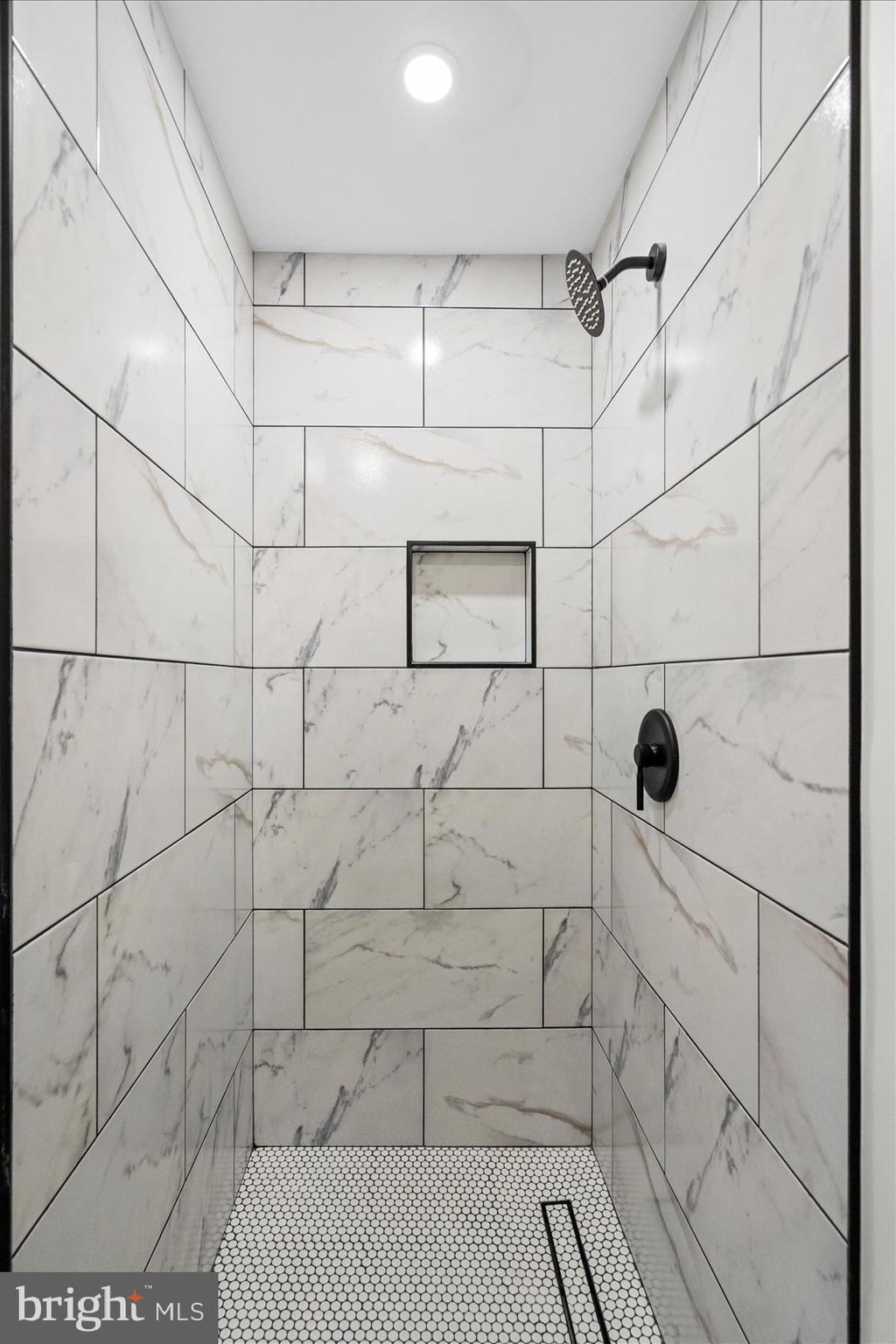 605 Elfin Avenue Capitol Heights, MD 20743 - Photo 31 of 42 a bathroom with a shower