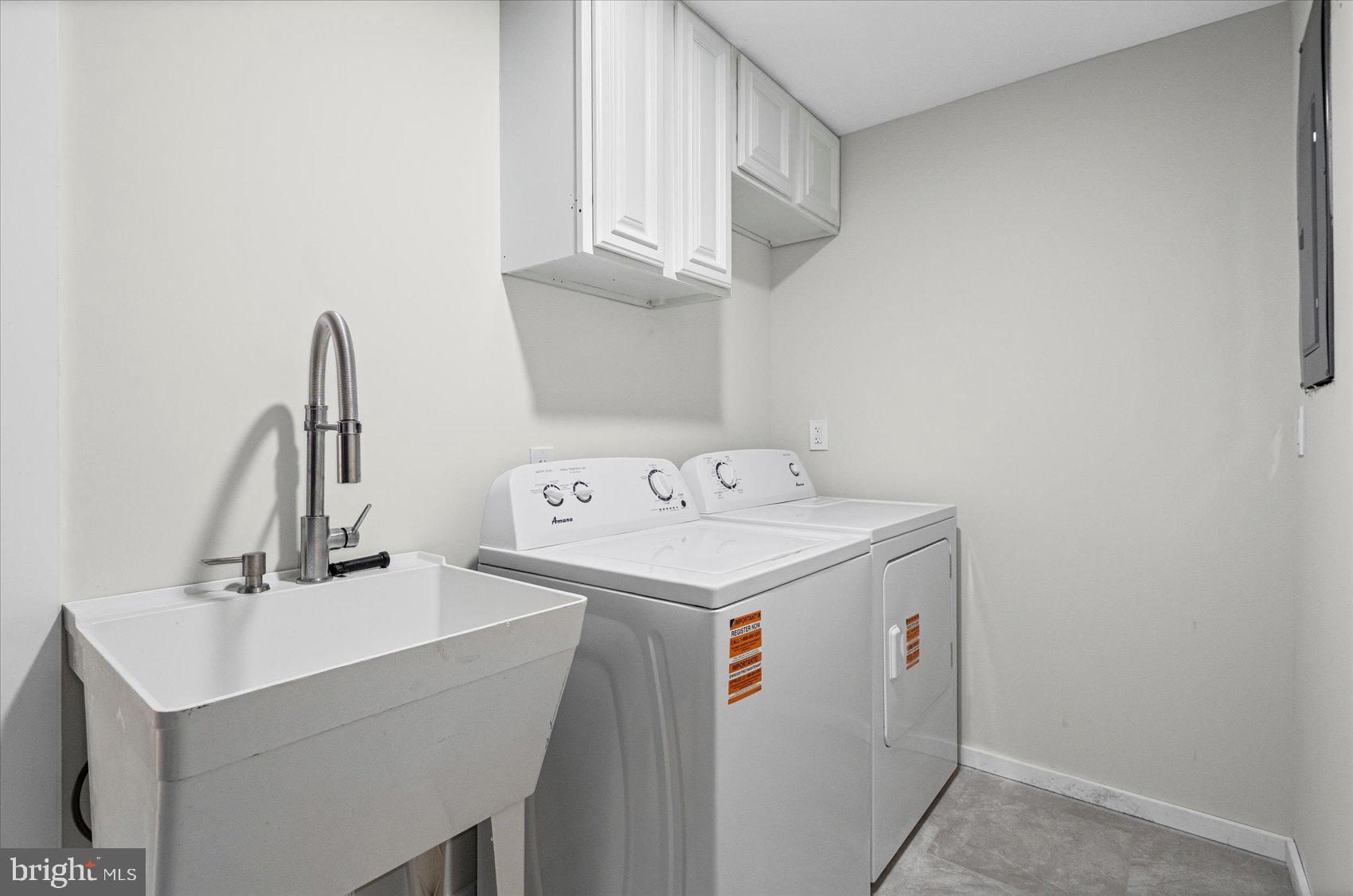 605 Elfin Avenue Capitol Heights, MD 20743 - Photo 38 of 42 a utility room with dryer and washer