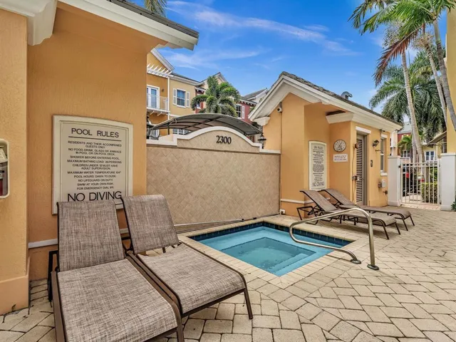 an aerial view of residential building and parking space