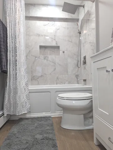 a view of a car parked in front of a building