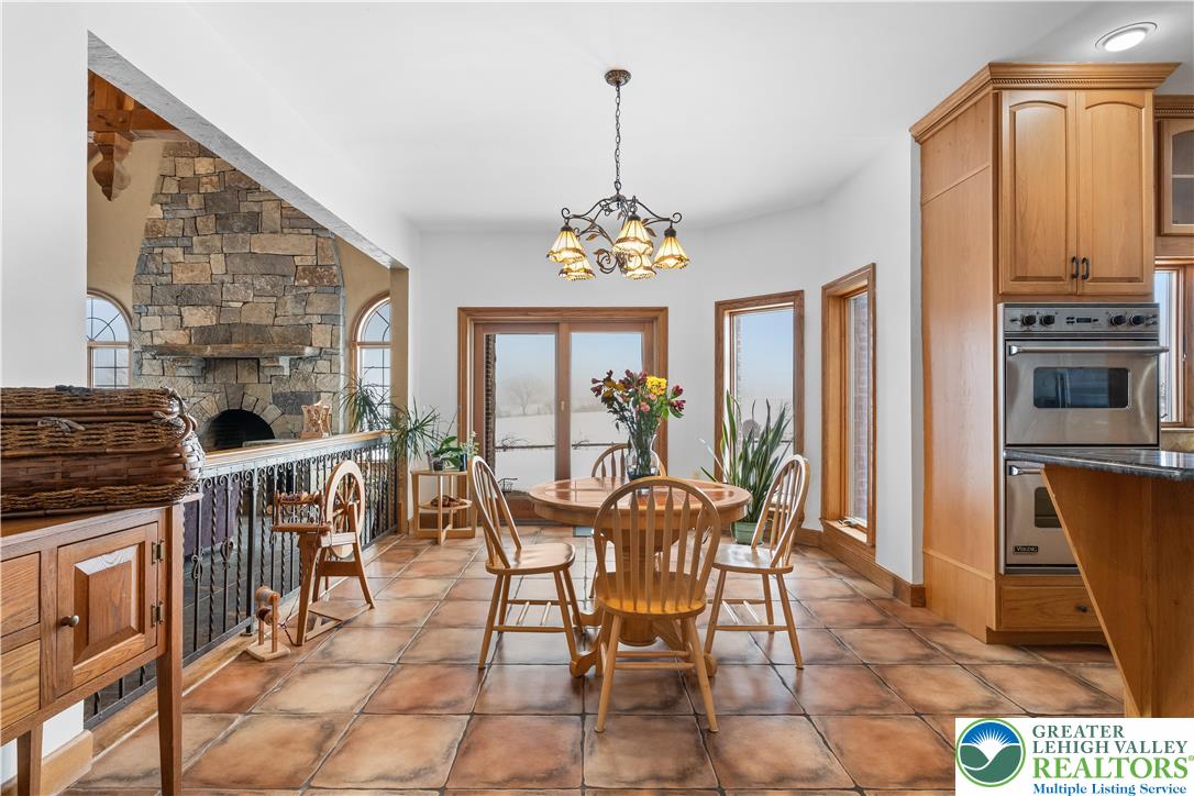 216 Merwinsburg Road Effort, PA 18330 - Photo 18 of 50 a view of a dining room with furniture window and outside view