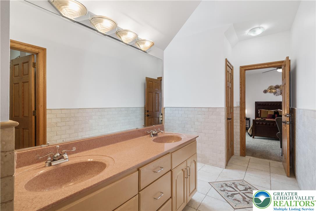 216 Merwinsburg Road Effort, PA 18330 - Photo 37 of 50 a bathroom with a sink and a mirror