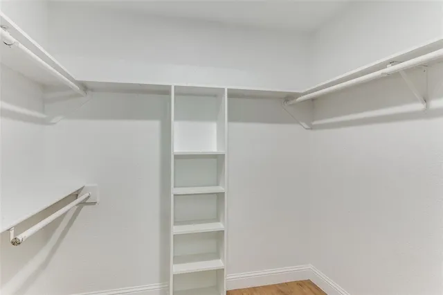 a bathroom with a tub and shower