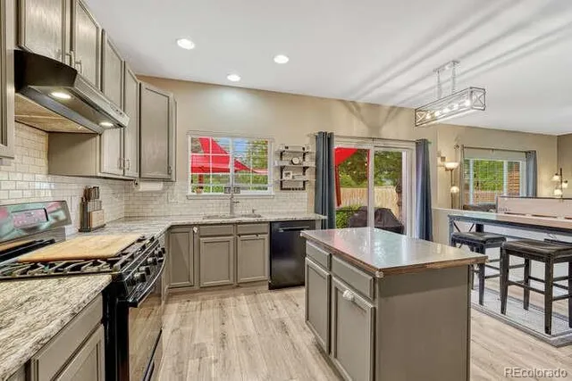 $614,900 | 18980 East Garden Drive, Aurora, CO 80015