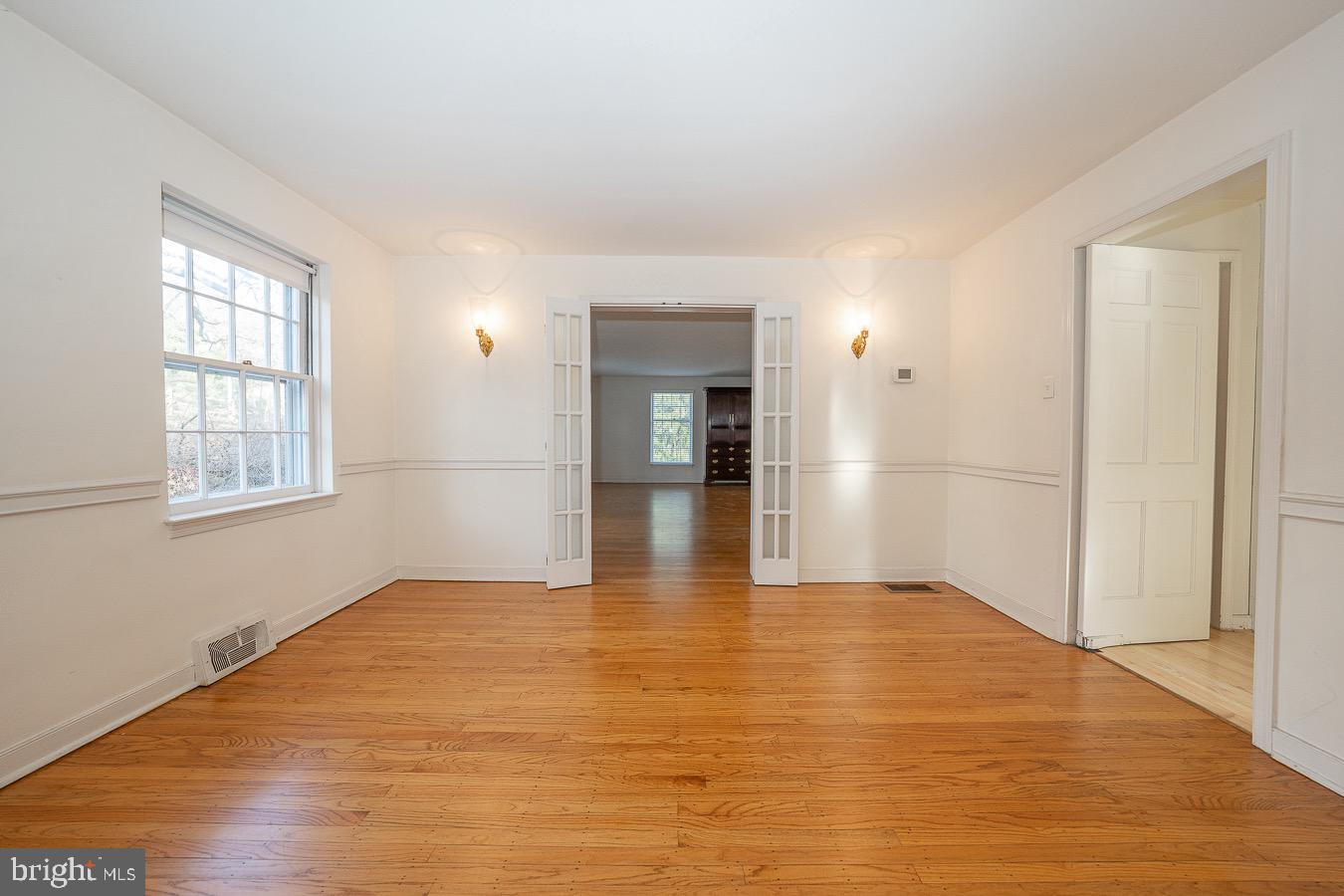 309 Church Road Devon, PA 19333 - Photo 9 of 48 Dining room with French doors to Living room