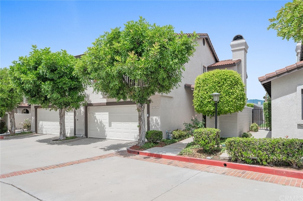 front view of a house with a street