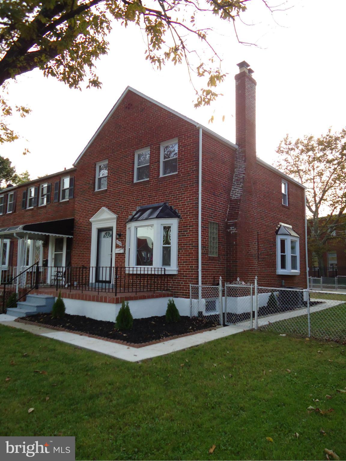 5720 Maplehill Road Baltimore, MD 21239 - Photo 2 of 25 a front view of house with yard and green space