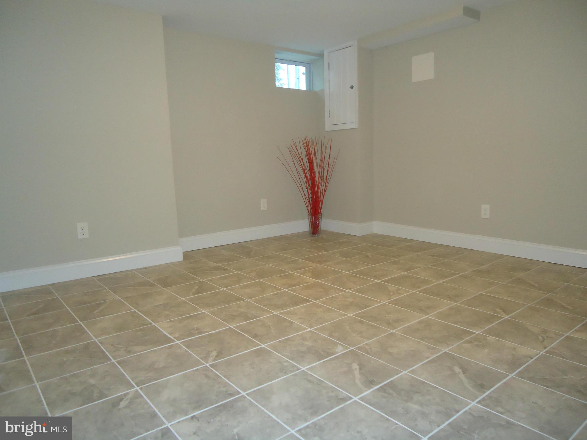 5720 Maplehill Road Baltimore, MD 21239 - Photo 15 of 25 view of an empty room