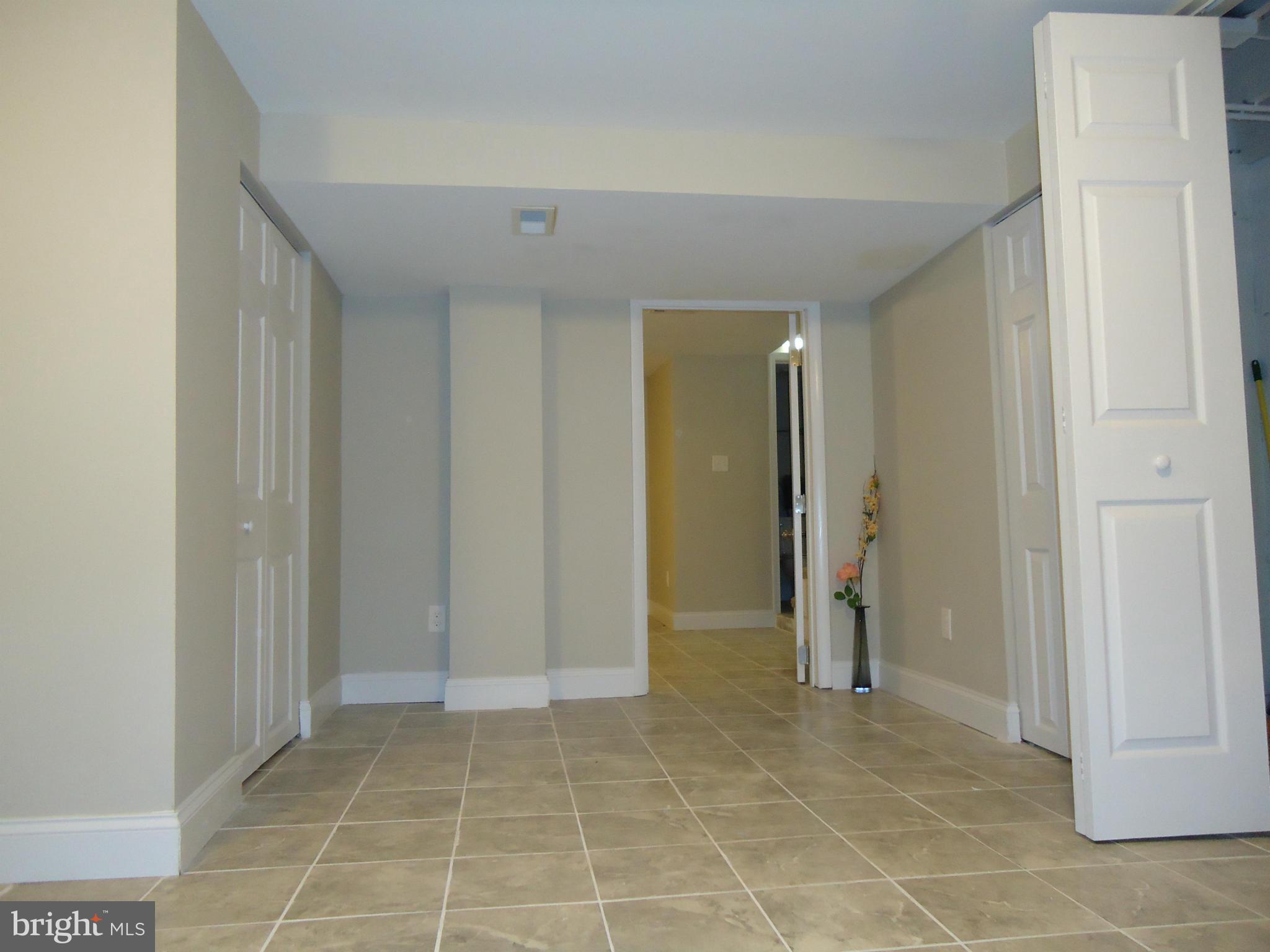 5720 Maplehill Road Baltimore, MD 21239 - Photo 18 of 25 a view of an empty room