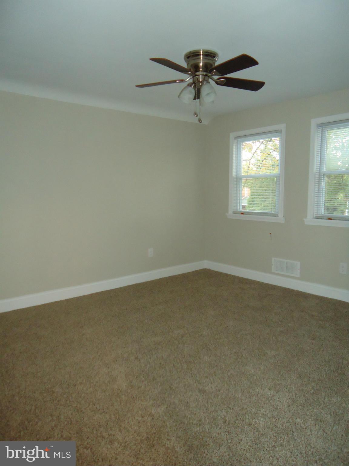5720 Maplehill Road Baltimore, MD 21239 - Photo 23 of 25 an empty room with a window